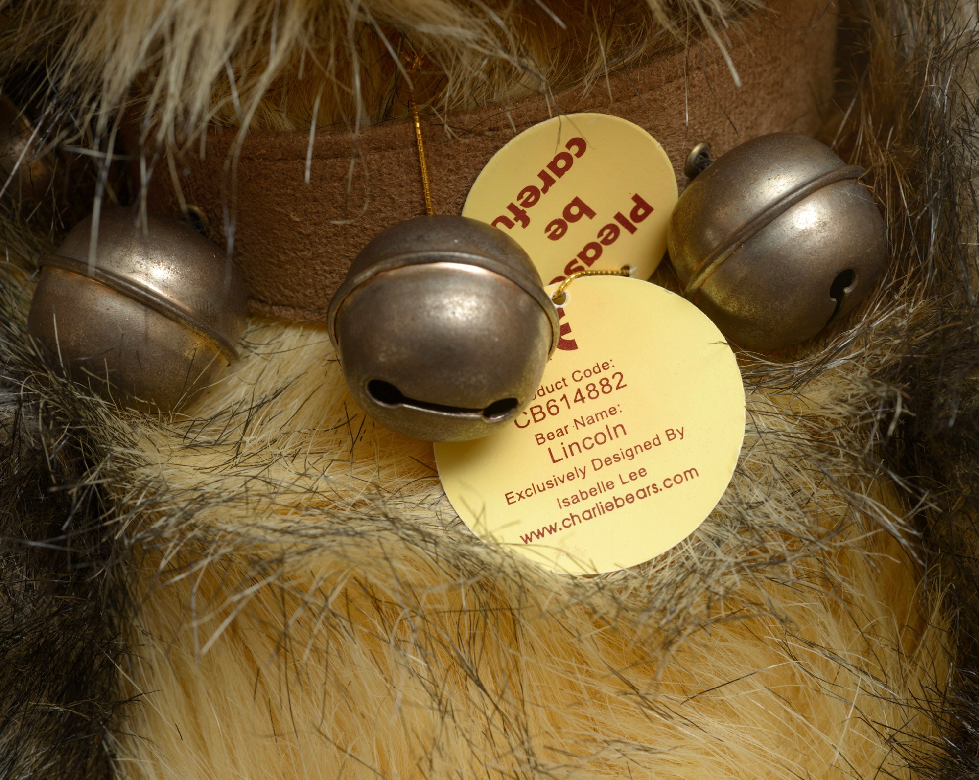 Charlie Bears Lincoln - Isabelle Collection - rear view showing tipped sandy gold and dark grey plush coat and Charlie Bears woven label