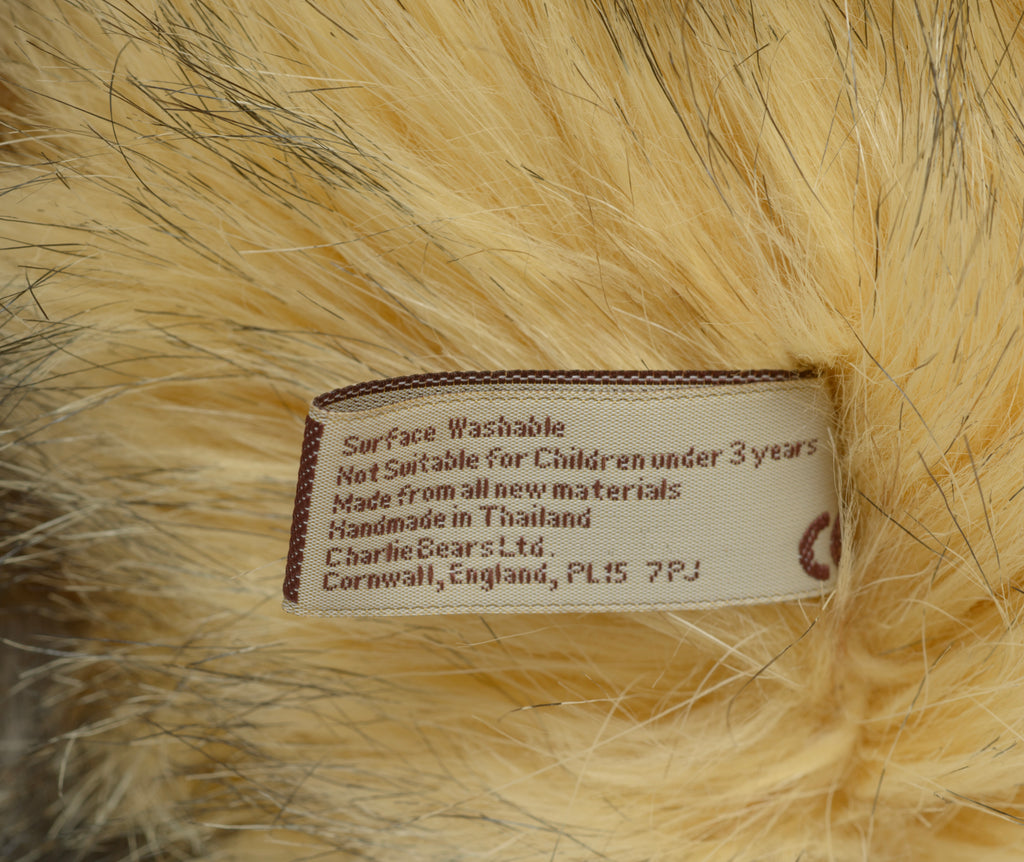 Charlie Bears Lincoln - Isabelle Collection - full front view showing tipped sandy gold and grey plush coat with five-bell suede collar