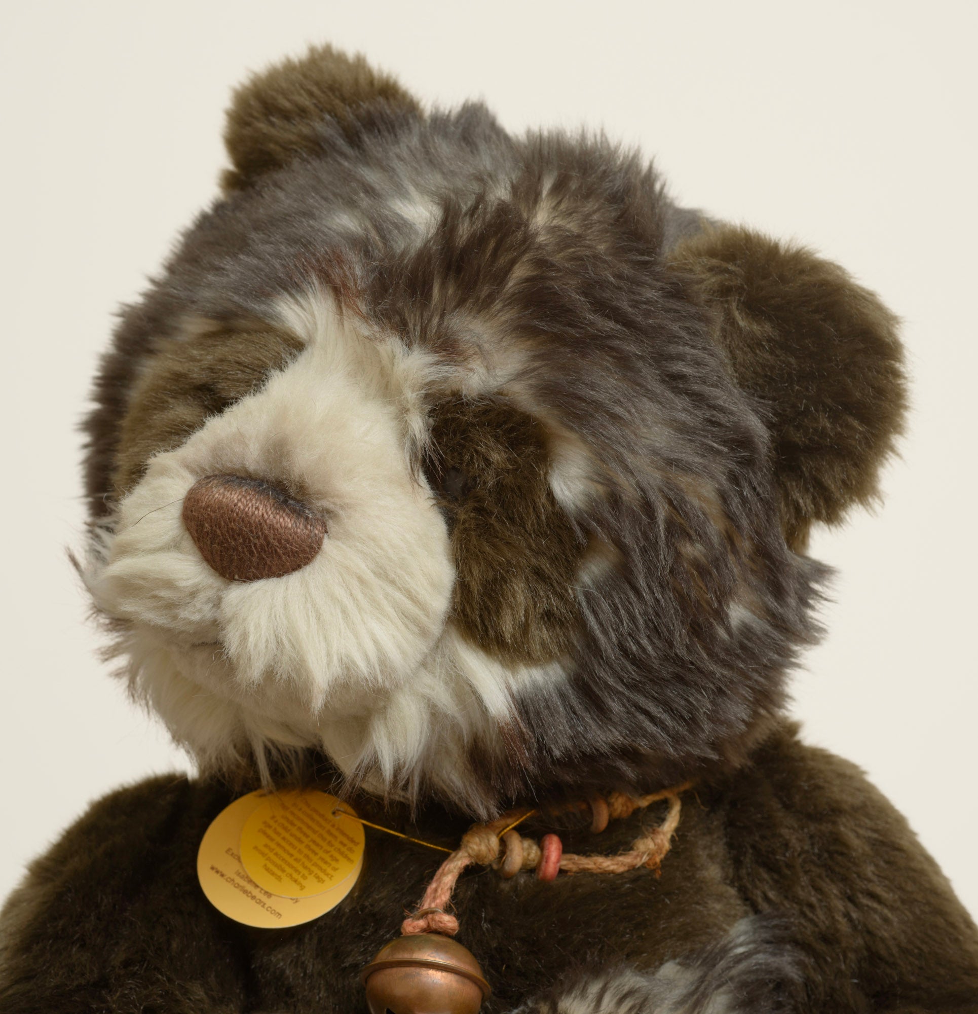 Charlie Bears Breeny - Isabelle Collection - swing tag showing product code CB131353, bear name Breeny, exclusively designed by Isabelle Lee
