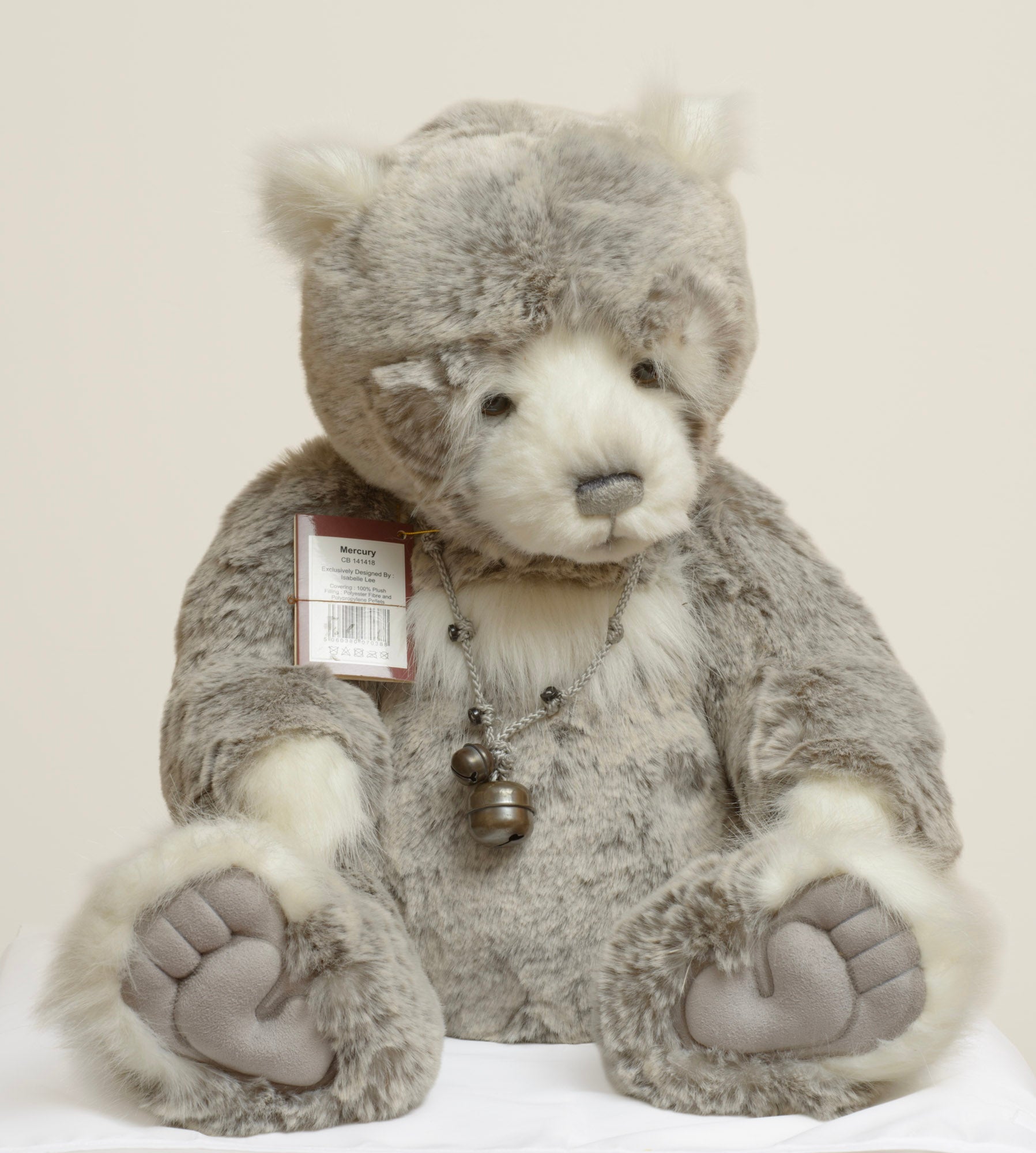 Charlie Bears Mercury - Isabelle Collection - full front view showing dappled grey tipped plush with white muzzle and twisted cord necklace with two bells