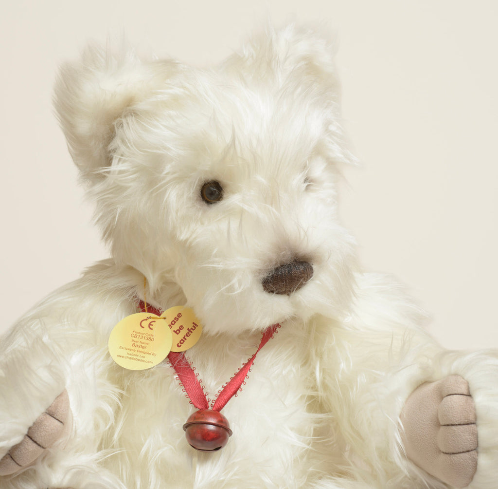 Charlie Bears Baxter - Isabelle Collection - swing tag and ribbon detail showing product code CB131380, bear name Baxter, exclusively designed by Isabelle Lee, with red picot ribbon and dark red bell