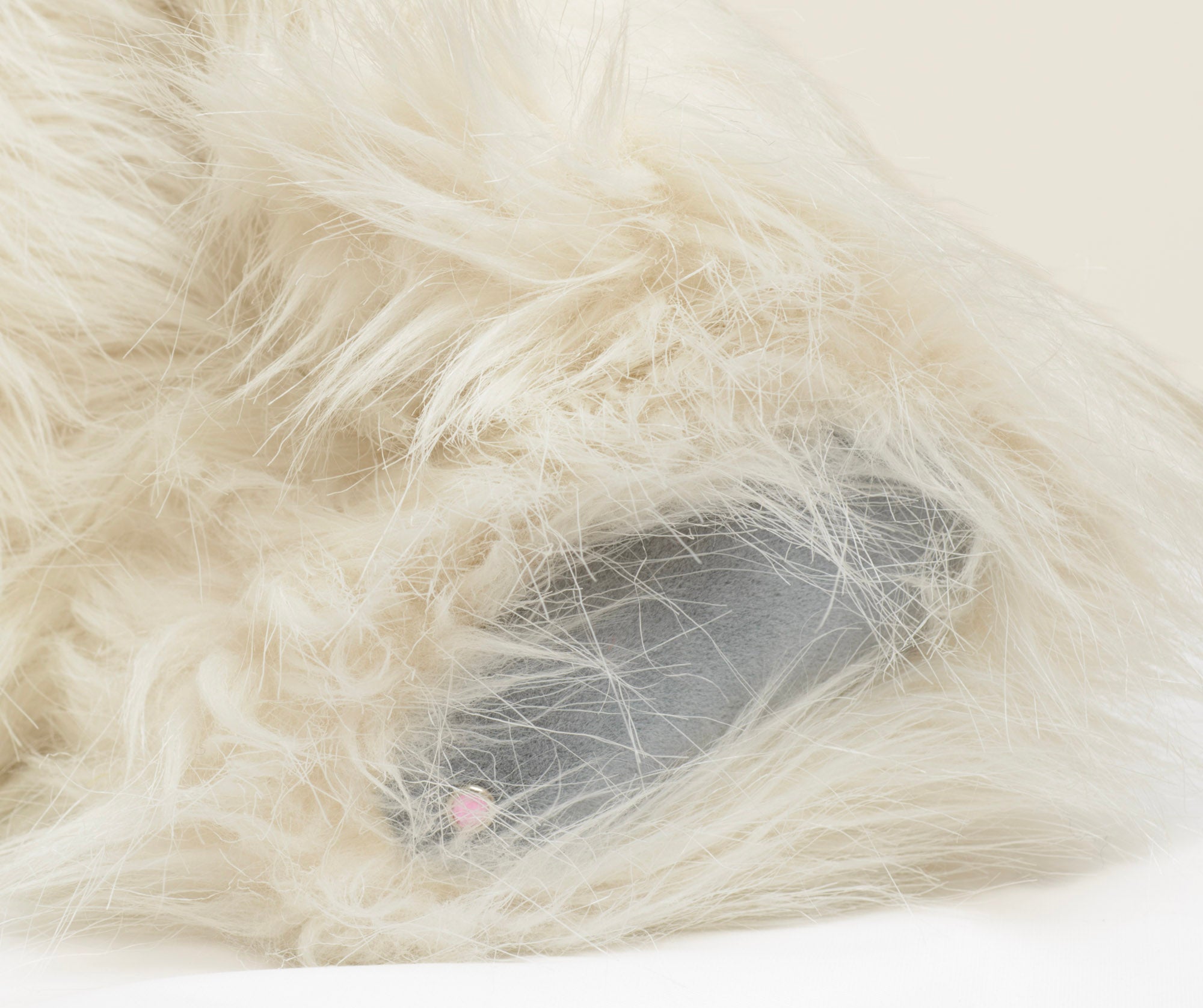 Kaycee Bears Mrs Kaycee - Kelsey Cunningham - full front seated view showing long wild cream ivory plush coat with pink frayed satin bow to one side of head
