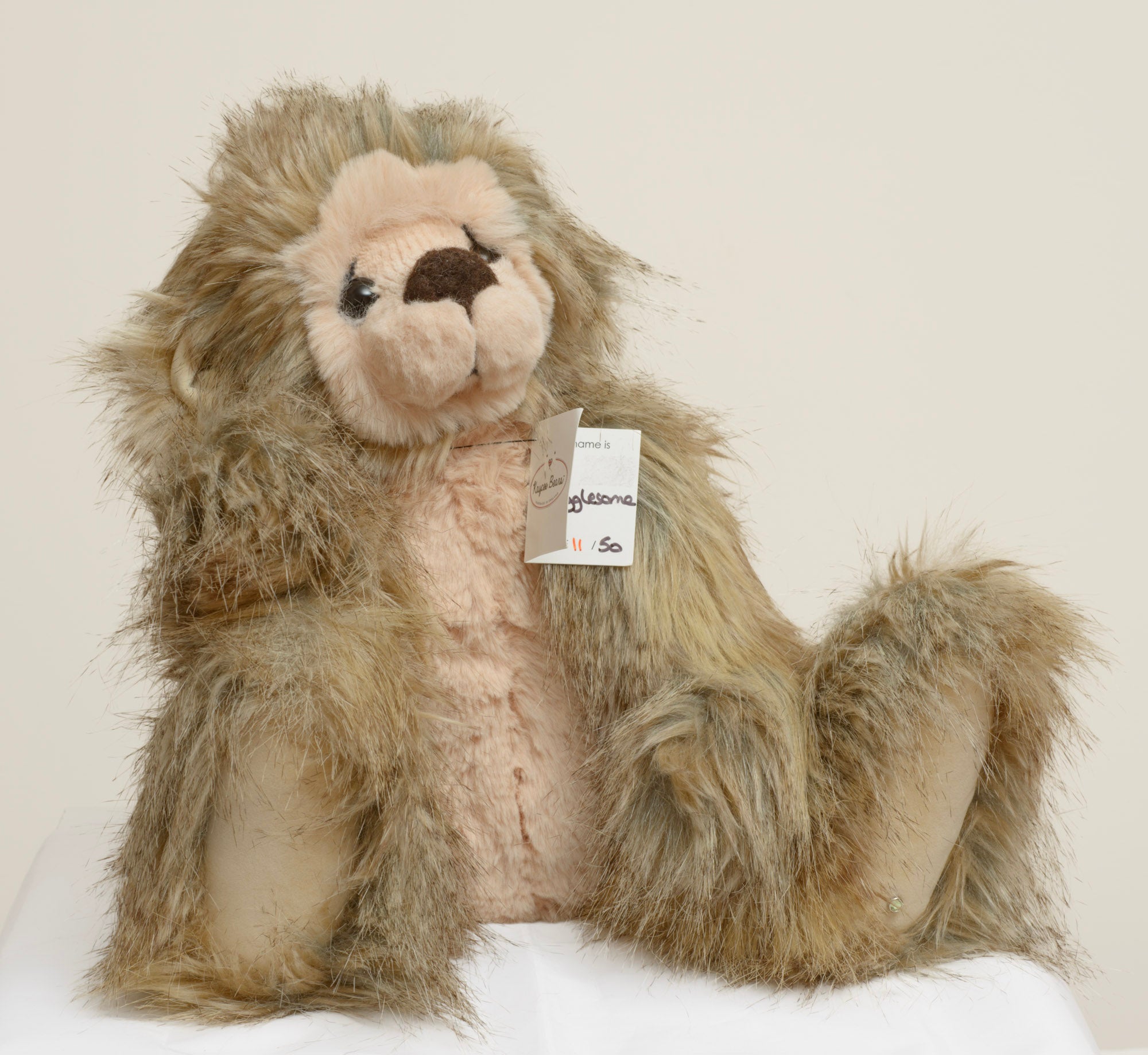 Kaycee Bears Hugglesome - Kelsey Cunningham - Handmade in ENGLAND label reading An Original Design by Kelsey Cunningham www.kayceebears.co.uk sewn to tummy panel