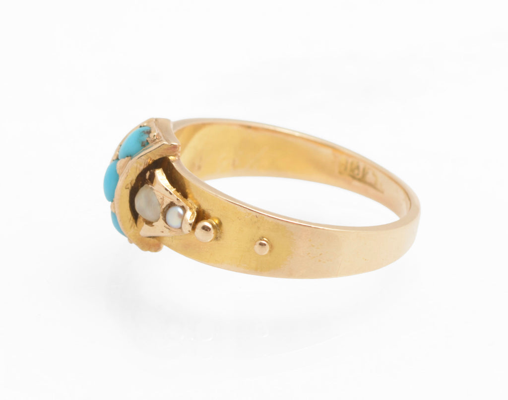 Victorian 15ct gold ring - natural turquoise and split pearls - full front view on ring stand showing complete strapwork head with turquoise and pearl arrangement and solid gold band