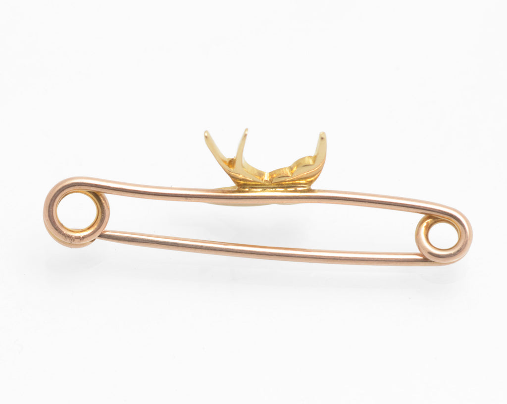 Victorian 15ct gold swallow brooch - natural turquoise and split pearls - front view showing full swallow in flight with swept wings, forked tail and turquoise and pearl set body on rose gold pin