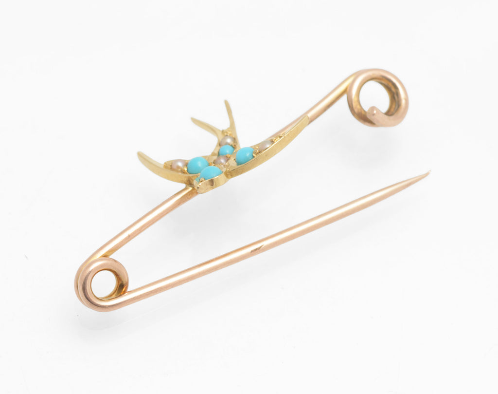 Victorian 15ct gold swallow brooch - natural turquoise and split pearls - full front view on double bar rose gold safety pin fitting showing swallow centred on bar with scroll ends
