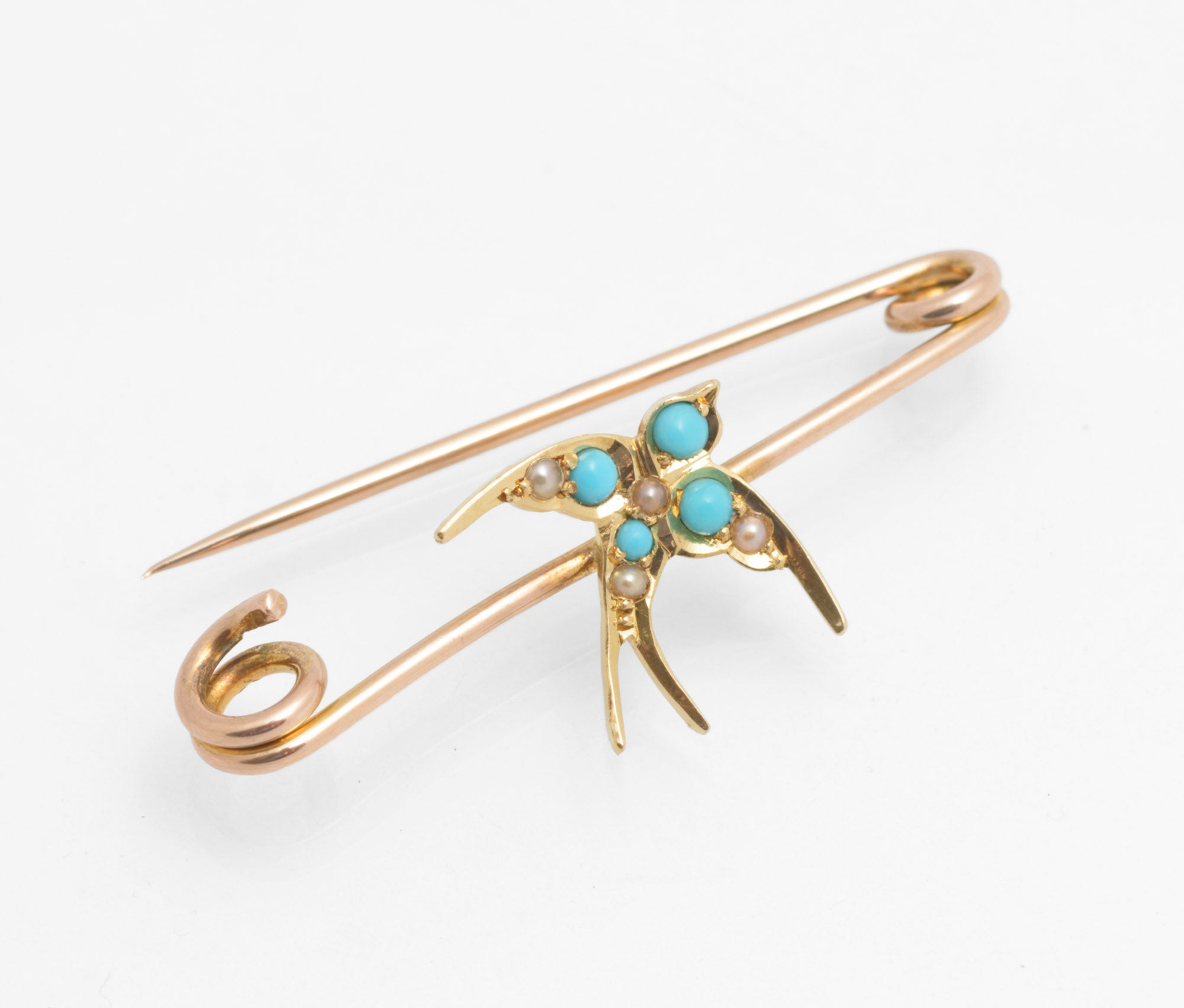 Victorian 15ct gold swallow brooch - natural turquoise and split pearls - close up face and breast detail showing turquoise cabochon and split pearl arrangement across wings