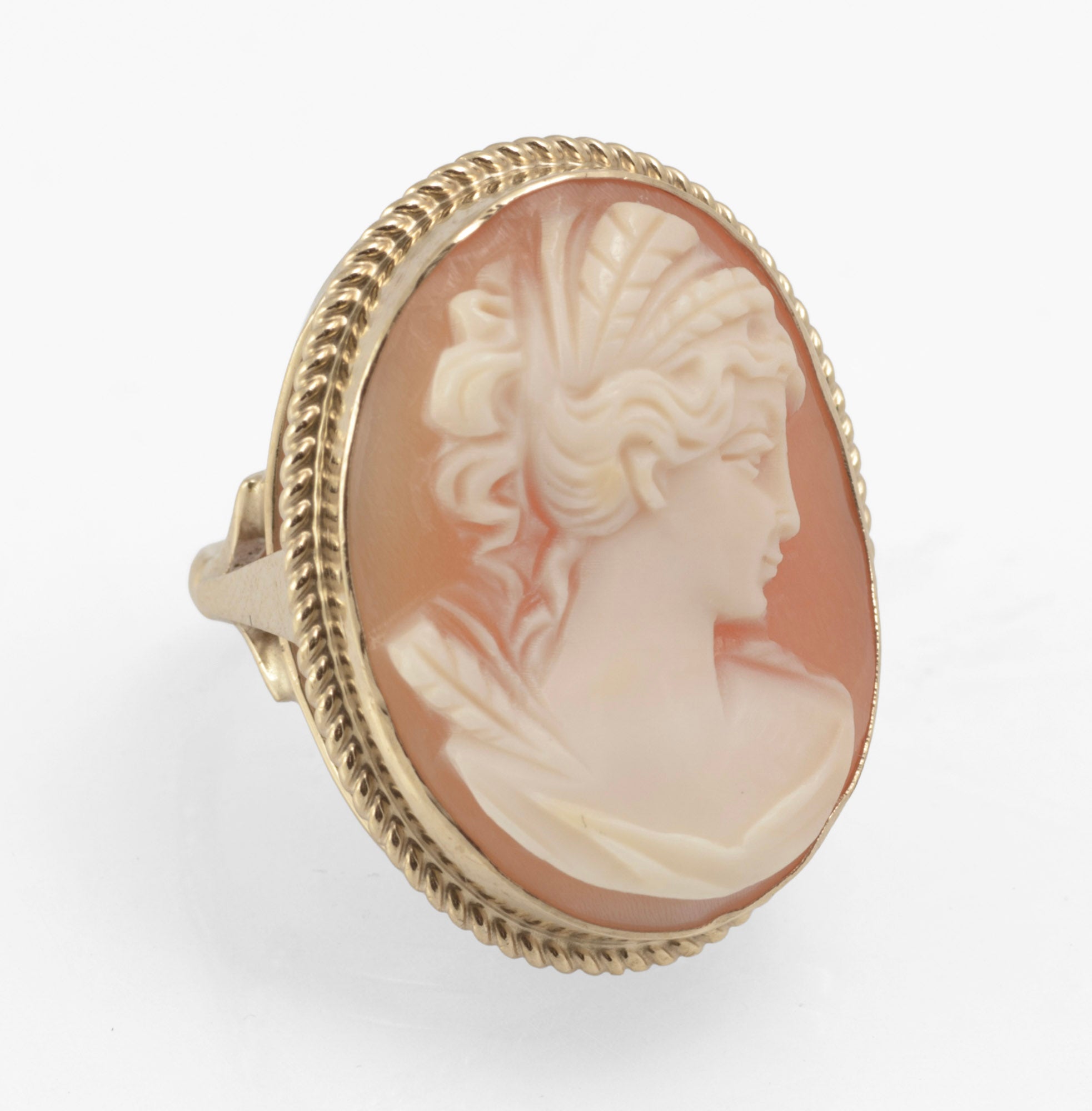 Vintage 9ct gold cameo ring - large carved shell portrait cameo - close up cameo detail showing fine hair strands swept back and pinned with loose curls at nape and clean facial profile