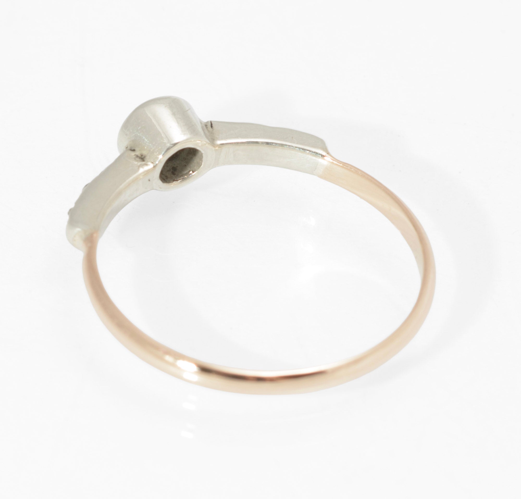 Art Deco moss agate ring - 9ct rose gold and silver - close up worn on hand showing moss agate cabochon and paste shoulder detail against rose gold band