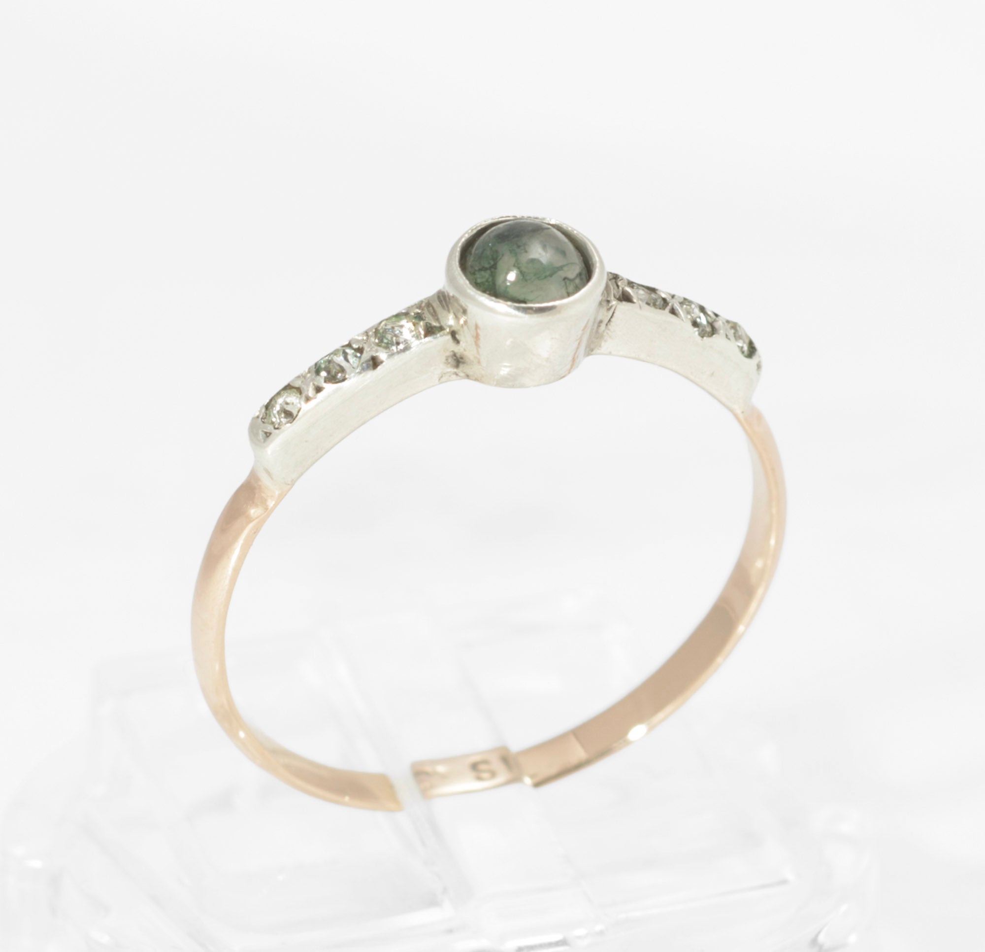Art Deco moss agate ring - 9ct rose gold and silver - three-quarter front view showing full ring with moss agate centre, paste shoulders and transition from silver head to rose gold band