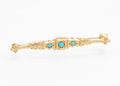 Vintage 9ct gold bar brooch - natural turquoise - Edwardian revival - front view showing three turquoise cabochons with raised central square collet setting flanked by scrolling acanthus leaf decoration and bead accents on white background