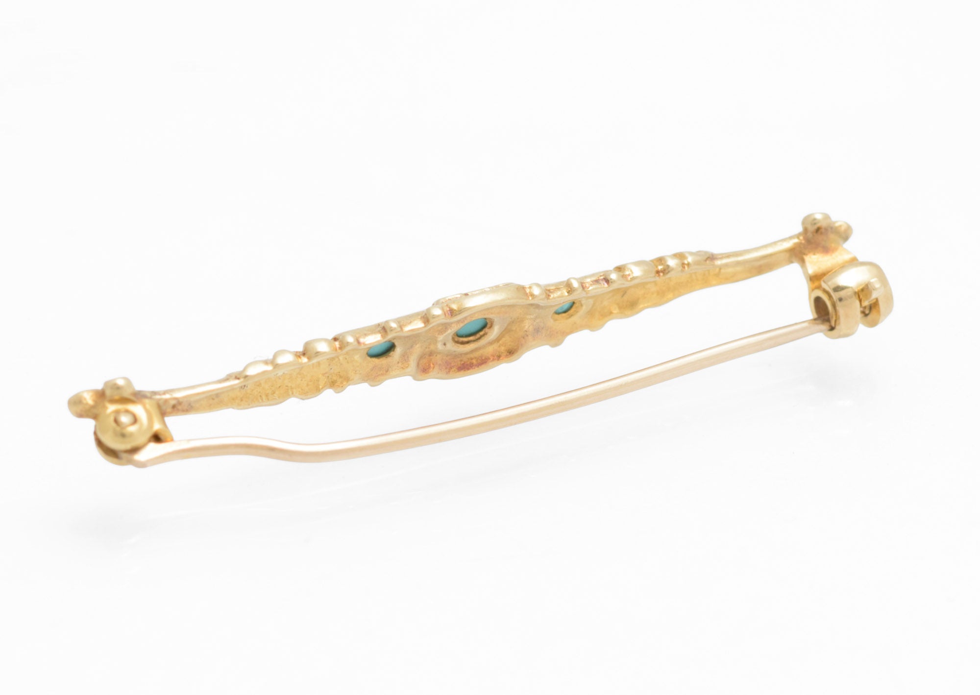 Vintage 9ct gold bar brooch - natural turquoise - Edwardian revival - rear view showing hinged pin and rollover safety catch with plain gold reverse on white background