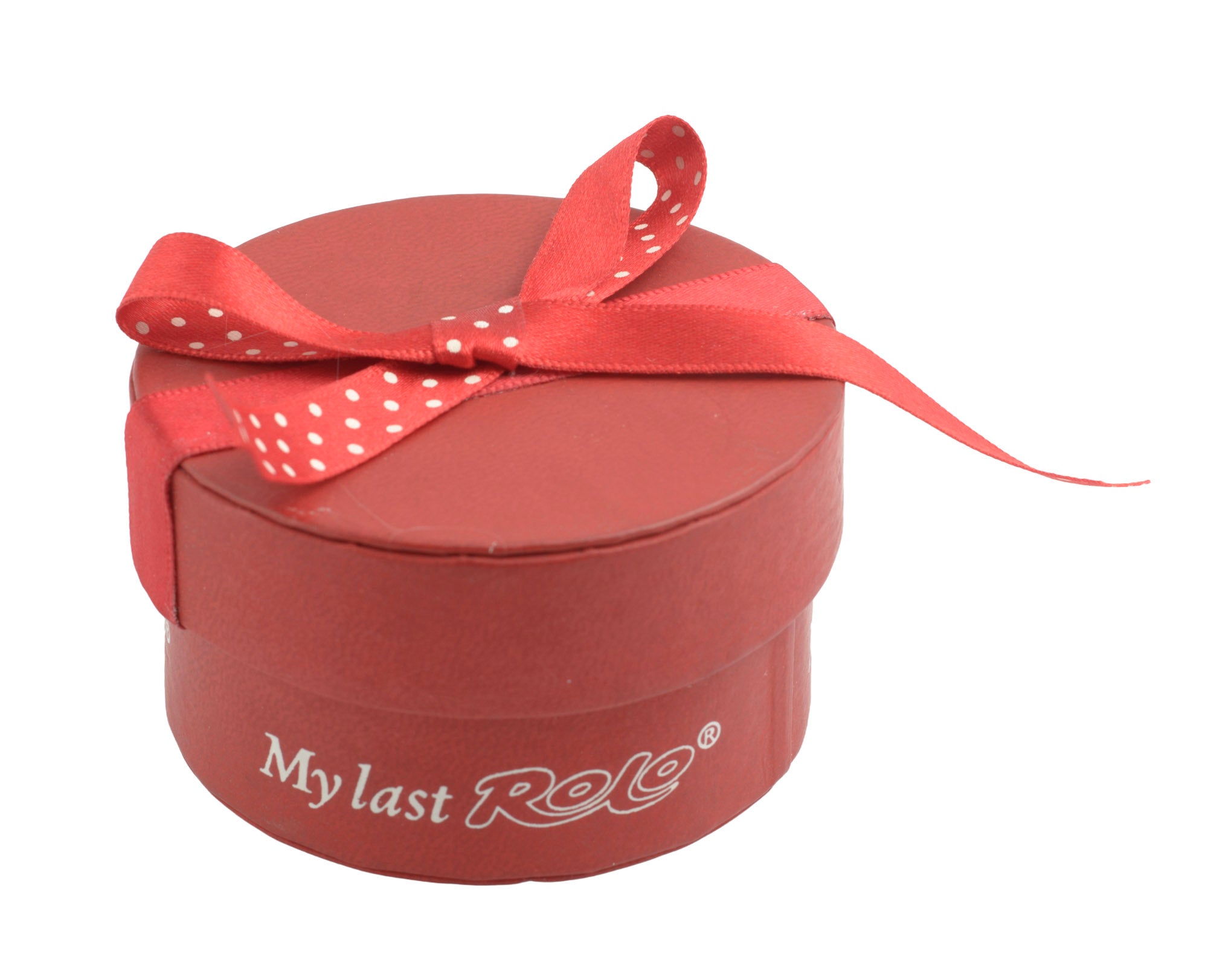 Sterling silver My Last Rolo keepsake - Sheffield 2005 - C. W. Sellors - solid silver Rolo in original red cylindrical My Last Rolo presentation box with polka dot ribbon, lid open on white background
