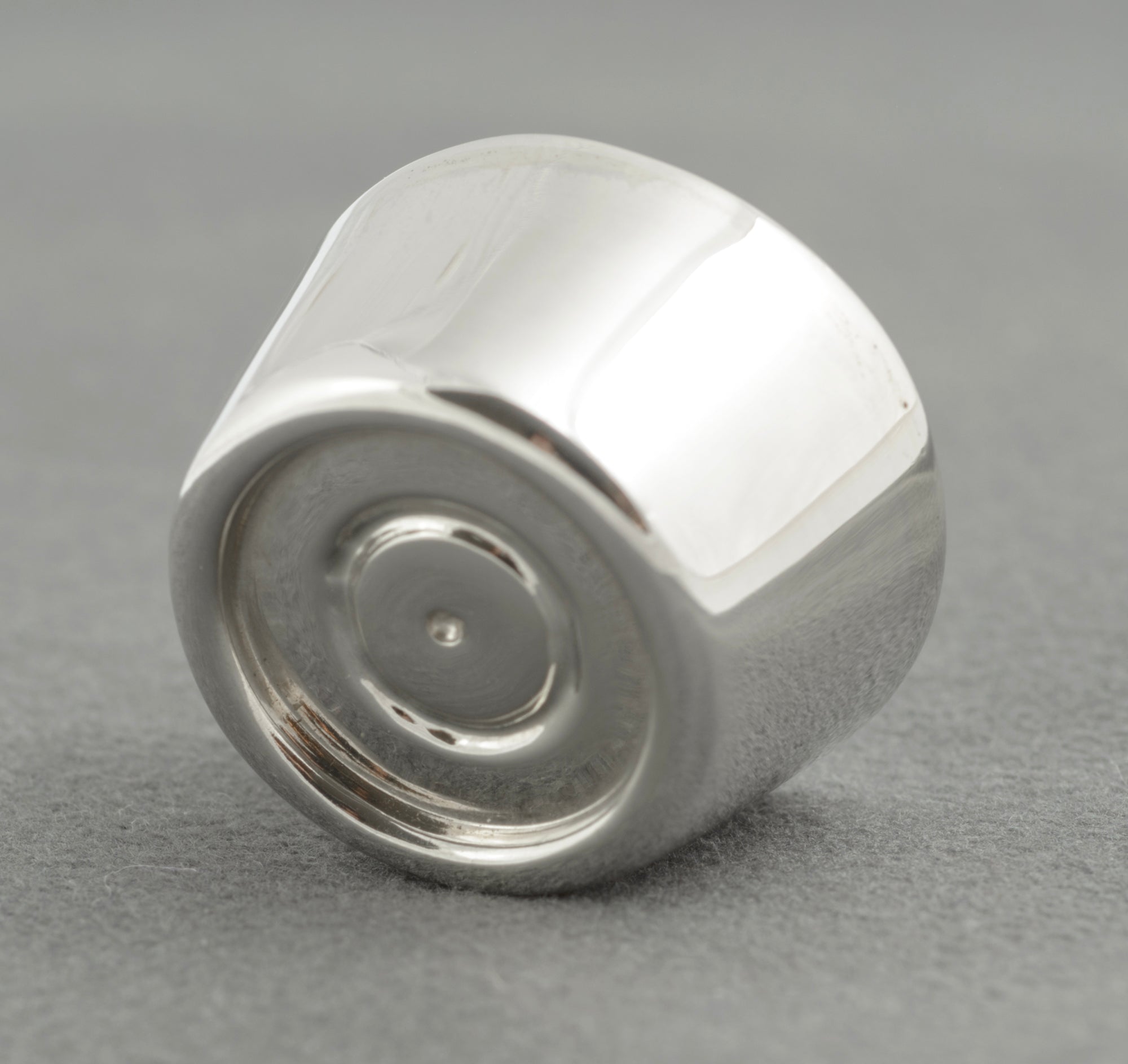 Sterling silver My Last Rolo keepsake - Sheffield 2005 - C. W. Sellors - top view of closed red cylindrical presentation box showing silver Rolo sitting in centre with My Last Rolo branding and C. W. Sellors text on white background