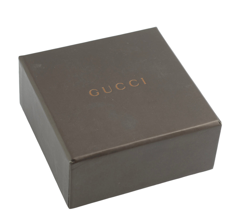 Gucci sterling silver chain link ring with heart charm - original dark chocolate brown Gucci presentation box closed showing embossed Gucci name on lid on white background
