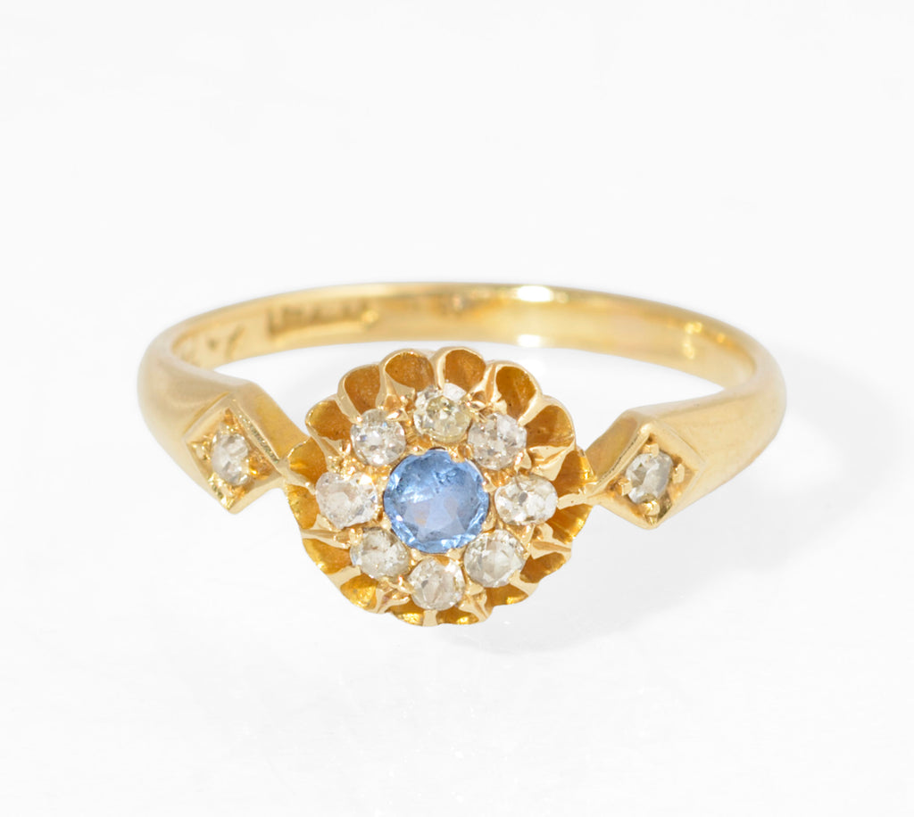 Antique 18ct gold sapphire and diamond cluster ring - side view showing buttercup setting and hallmark inside band