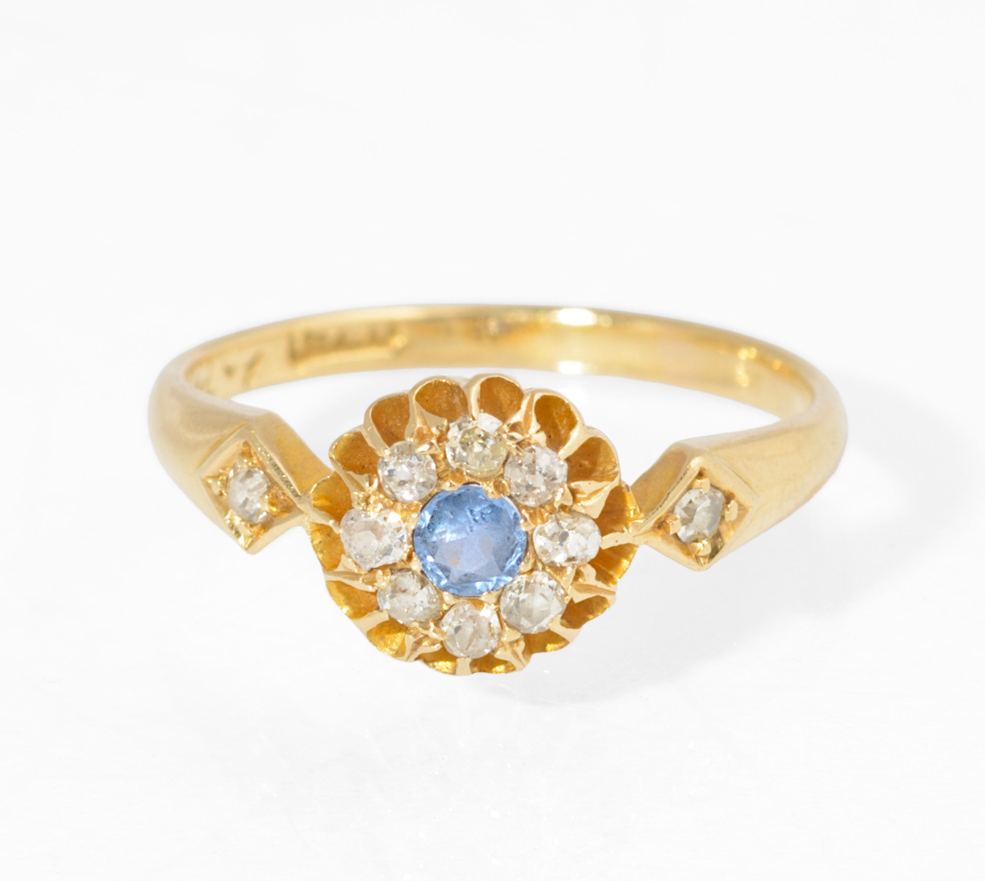 Antique 18ct gold sapphire and diamond cluster ring - side view showing buttercup setting and hallmark inside band