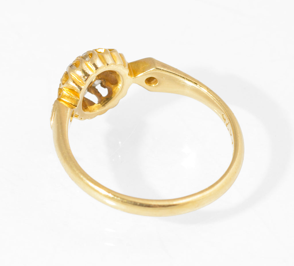 Antique 18ct gold sapphire and diamond cluster ring - close up of sapphire and old mine cut diamond halo
