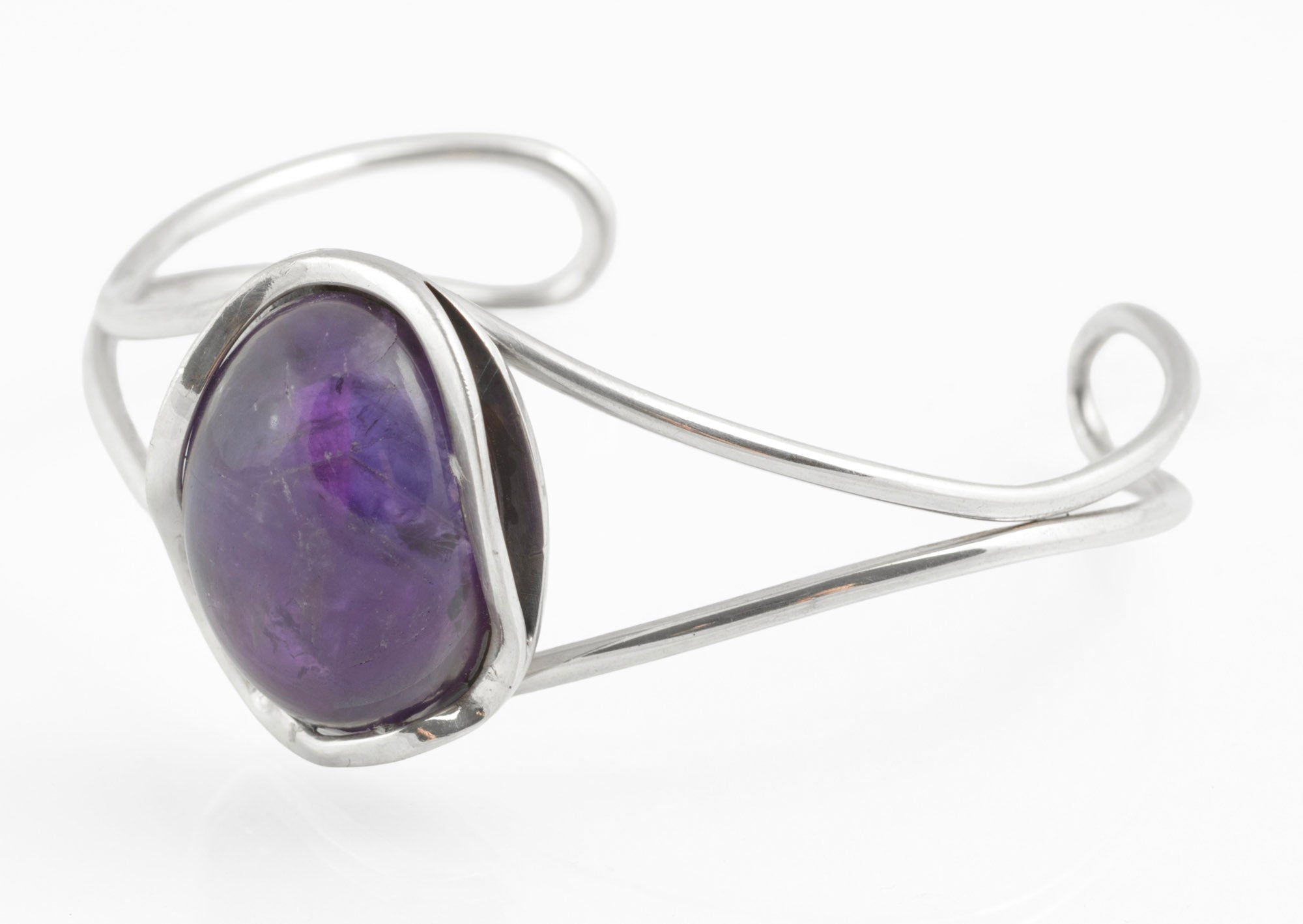 Vintage sterling silver amethyst cabochon bangle - Polish handmade - Gdańsk 925 - close up rear view on white background showing Gdańsk 925 hallmark clearly struck to reverse of bezel and hallmarks along inner bangle arm