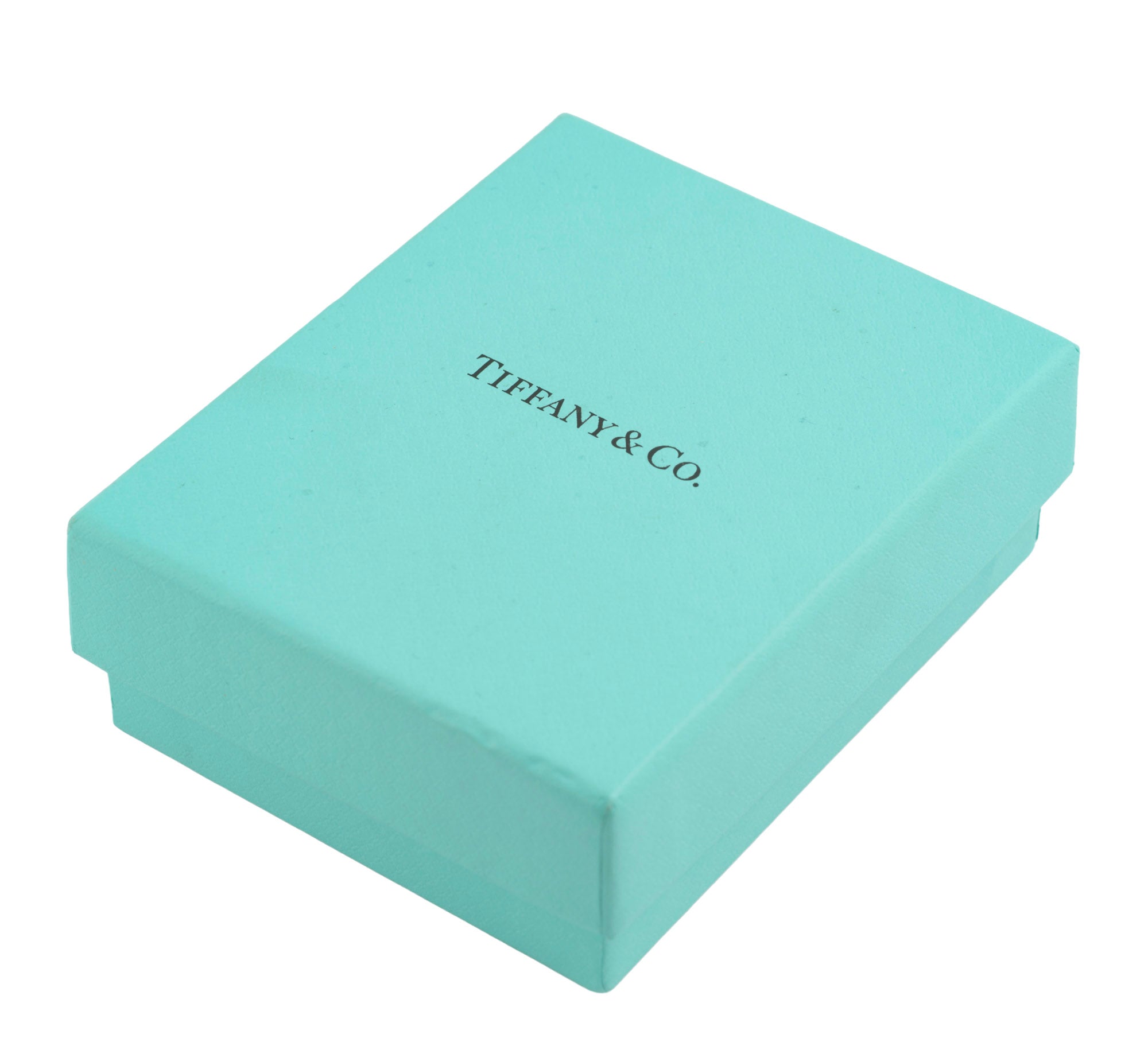 Tiffany and Co Metropolis sterling silver cuff bangle - 925 - top view on grey background showing flat top face with flush set screw head edge detail running full circumference and open cuff form