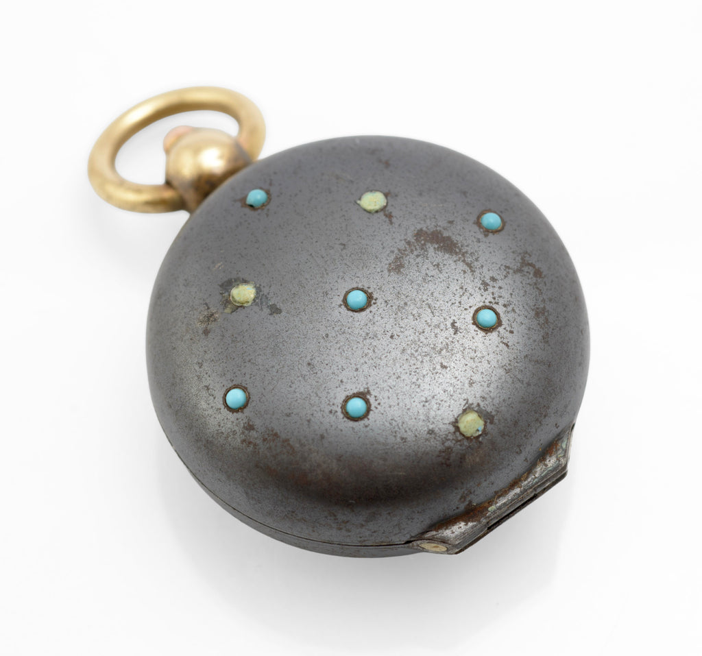 Antique gun metal finished steel full sovereign case with scattered turquoise cabochon decoration and brass suspension loop front face view on white background