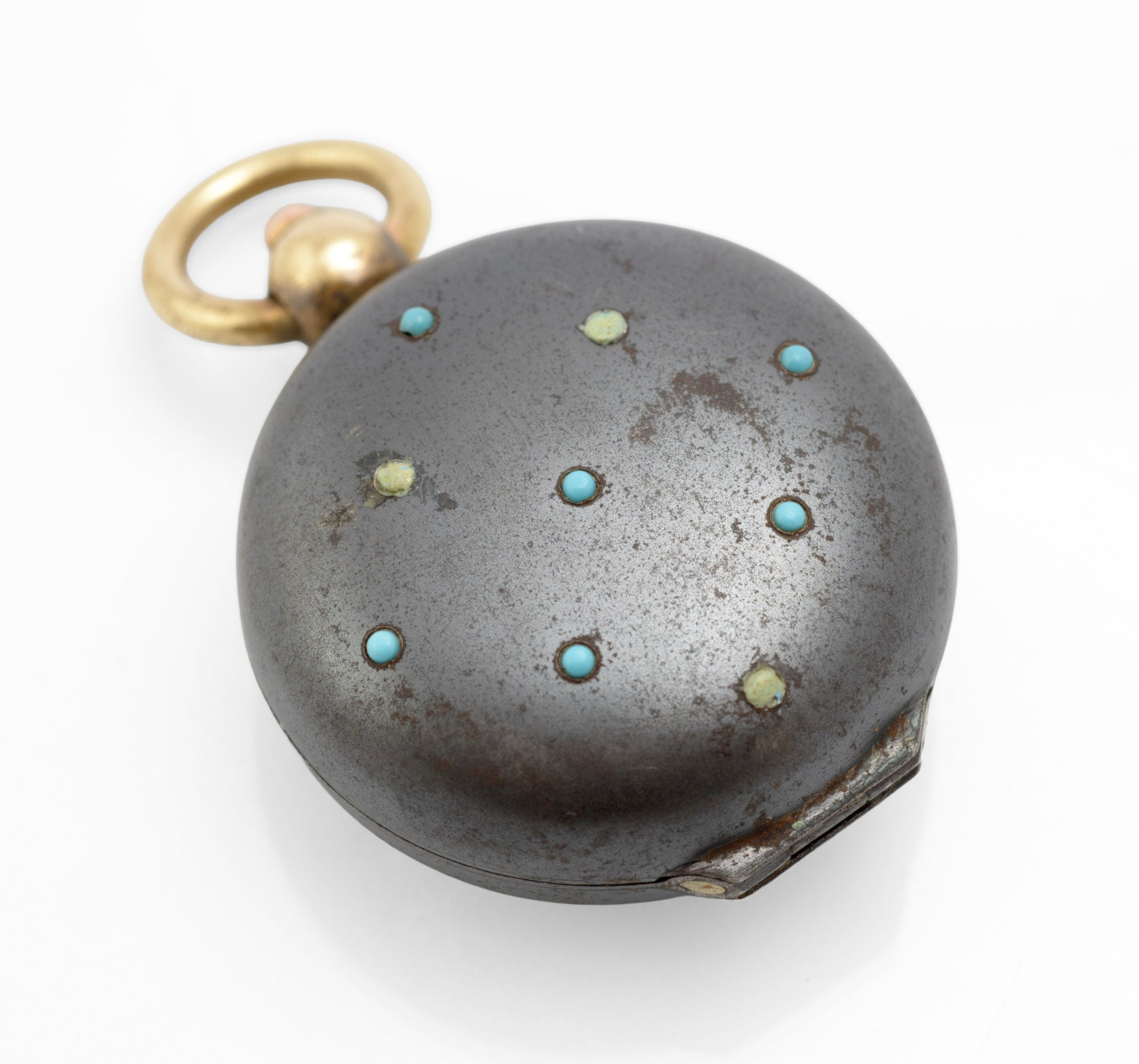 Antique gun metal finished steel full sovereign case with scattered turquoise cabochon decoration and brass suspension loop front face view on white background