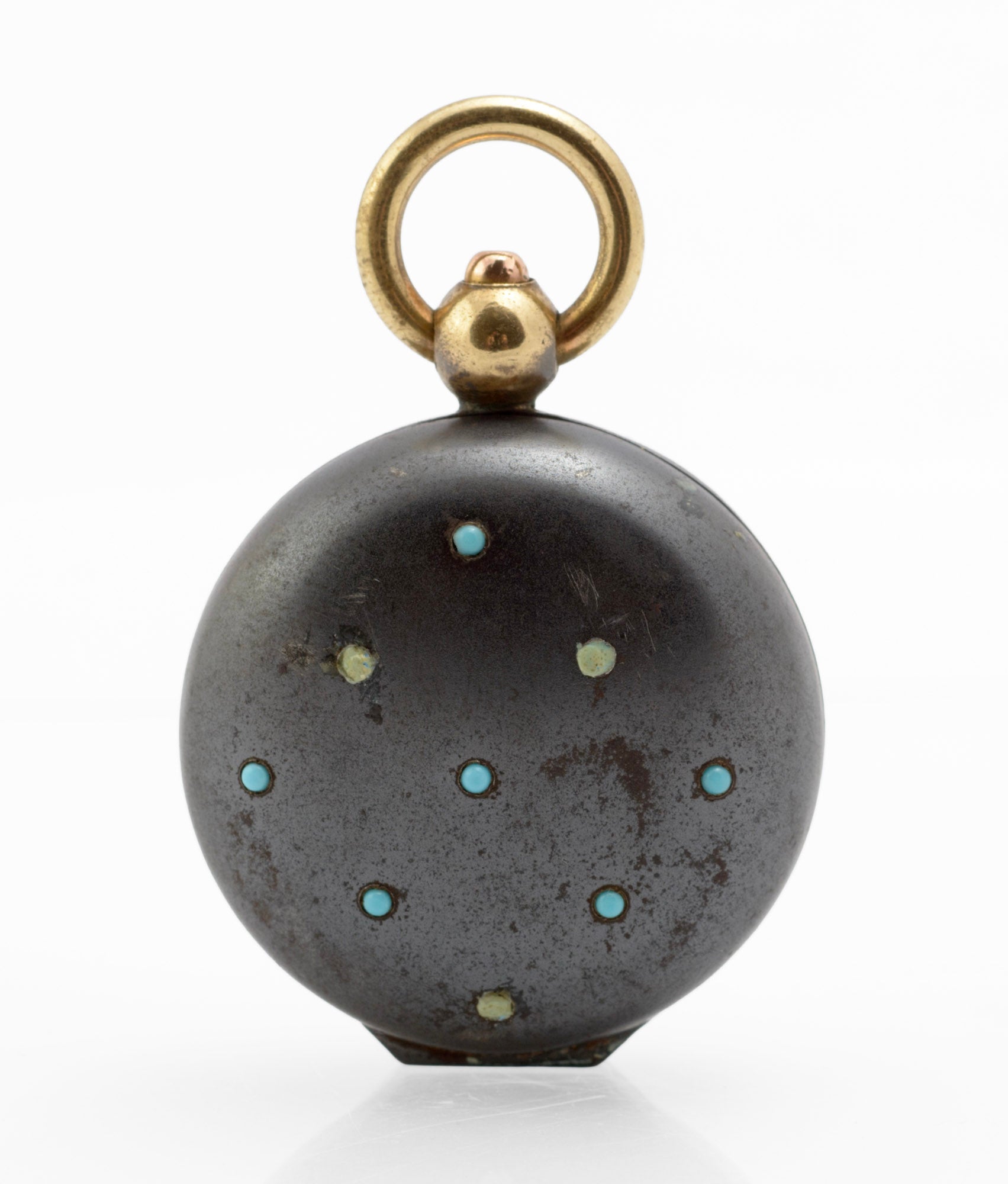 Antique gun metal sovereign case rear view showing plain dark patinated steel domed back with brass suspension loop and hinge on white background