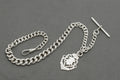 Antique sterling silver Albert watch chain T bar close up showing hallmarks to each arm, Birmingham 1895
