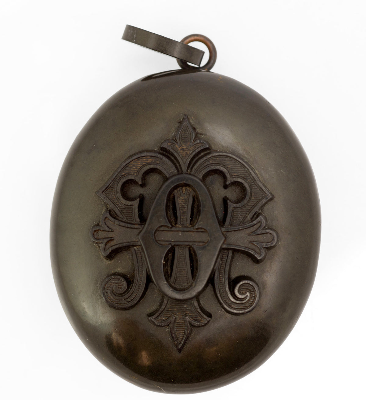 Antique Victorian vulcanite mourning locket rear view showing plain domed reverse and vulcanite suspension loop