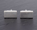 Vintage Gucci Trademark sterling silver cufflinks pair front view showing engraved Gucci Made in Italy branding on polished rectangular heads