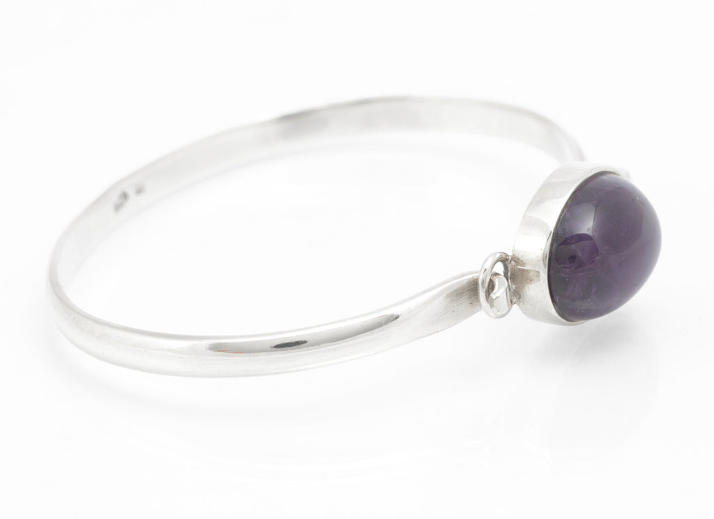 Sterling silver amethyst cabochon bangle showing open ends and bezel setting from the reverse