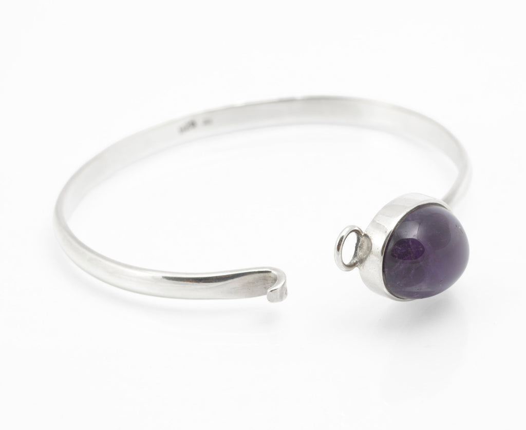 Hallmark detail inside sterling silver amethyst bangle showing 925, Birmingham 2009 and maker's mark CR