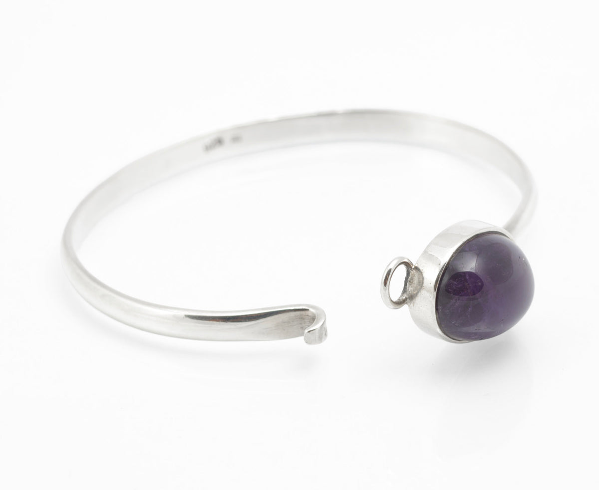 Hallmark detail inside sterling silver amethyst bangle showing 925, Birmingham 2009 and maker's mark CR