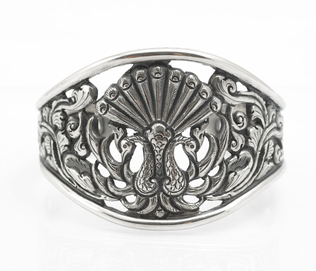 Vintage Yogya 800 silver cuff bangle close up of scrolling foliage and pierced openwork with retained dark patination