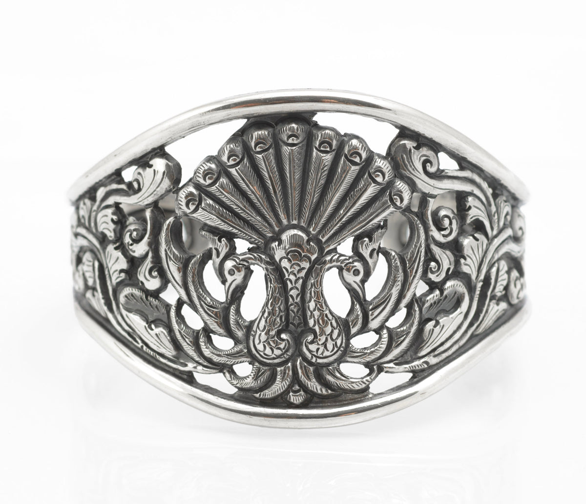 Vintage Yogya 800 silver cuff bangle close up of scrolling foliage and pierced openwork with retained dark patination