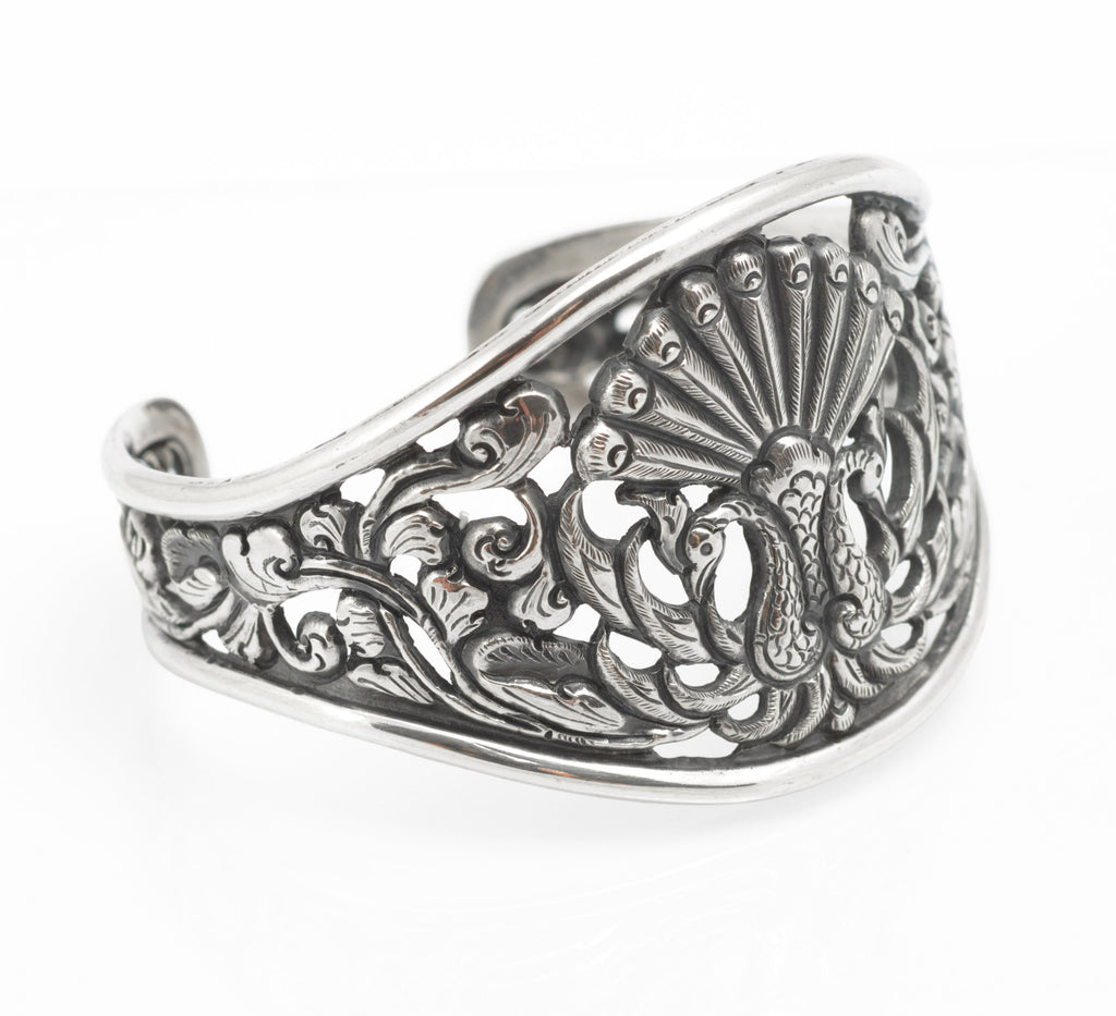Vintage Yogya 800 silver cuff bangle second angled view showing depth of pierced openwork and engraved feathering detail