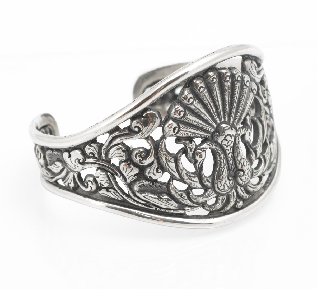 Vintage Yogya 800 silver cuff bangle second angled view showing depth of pierced openwork and engraved feathering detail