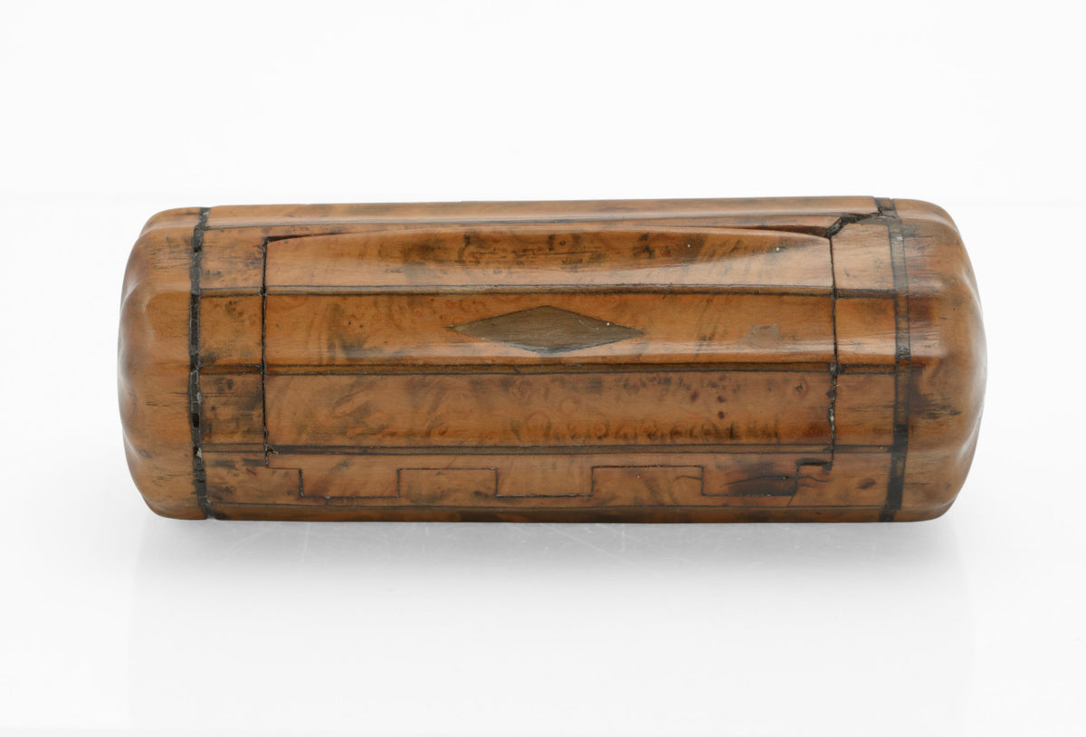 Open antique burr walnut barrel snuff box showing jigsaw hinge and lined interior