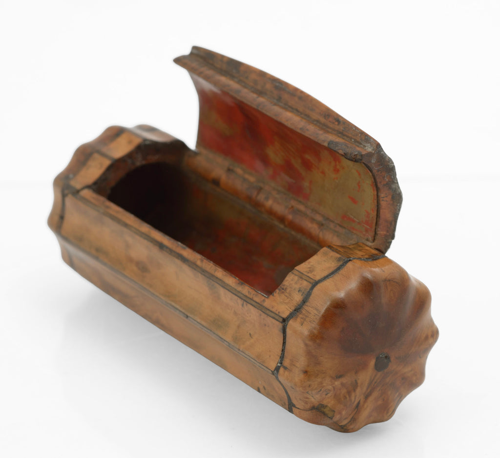 Underside of antique burr walnut barrel snuff box showing fluted body and contrasting stringing