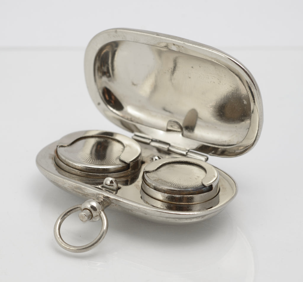 Closed antique silver plated double sovereign case with suspension ring and period wear