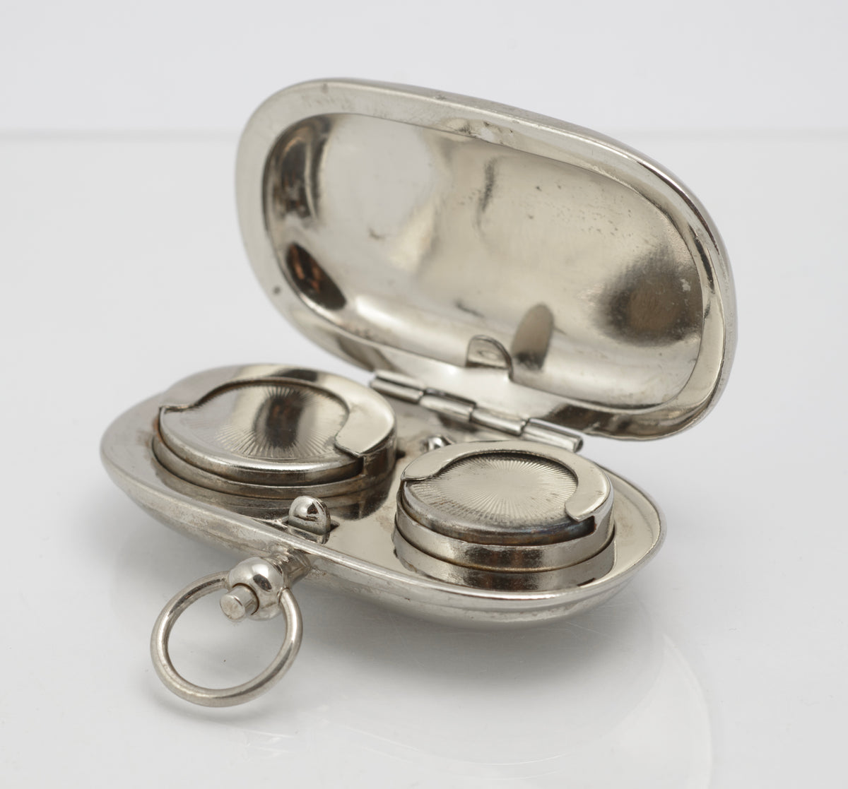 Closed antique silver plated double sovereign case with suspension ring and period wear