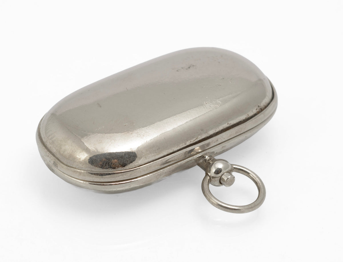 Open antique double sovereign case showing two fitted circular compartments and reflective lid interior