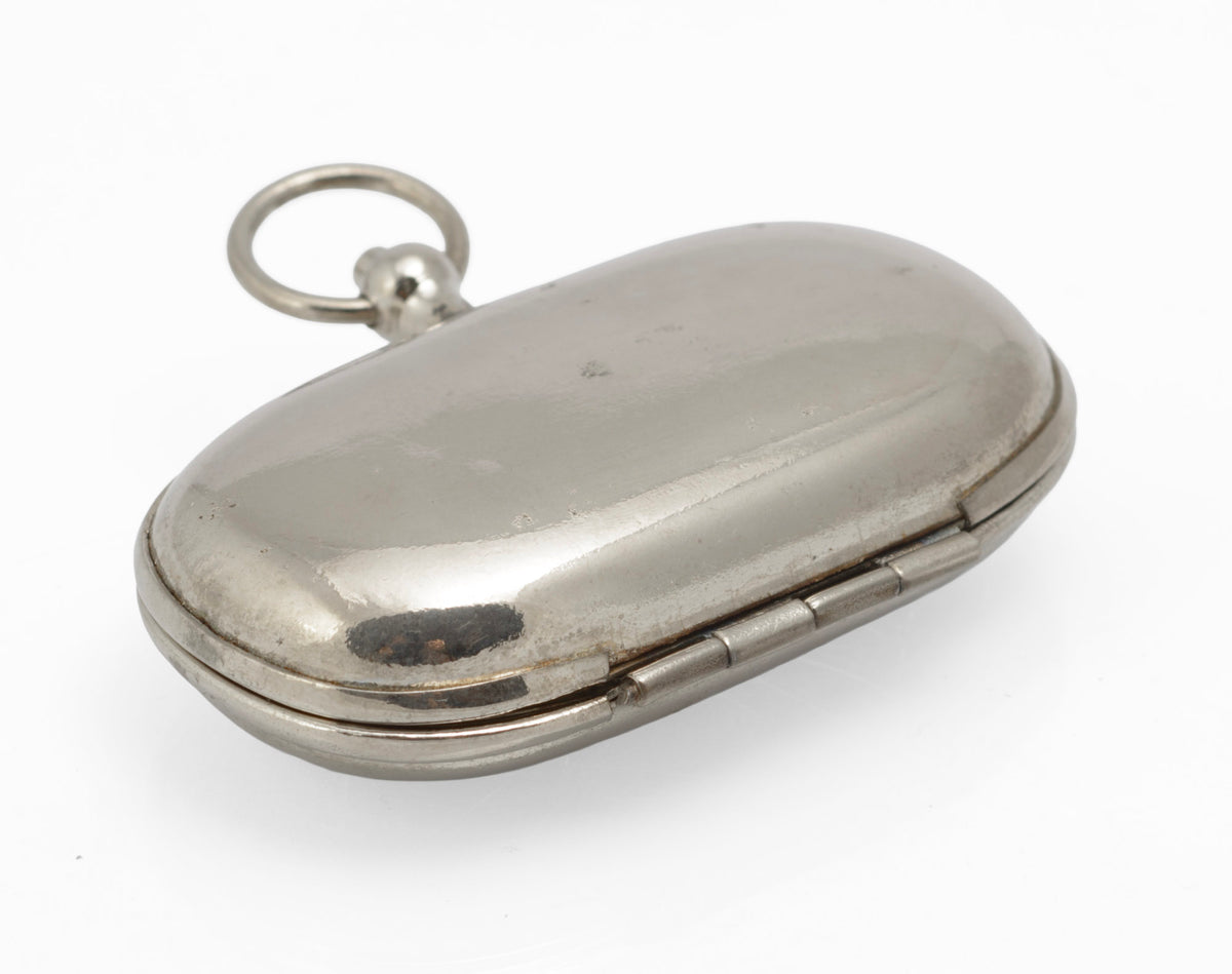 Antique silver plated double sovereign holder open with two coin compartments and suspension ring