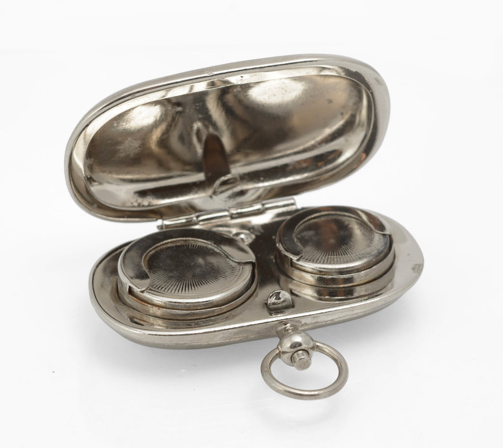 Silver plated double sovereign case closed, showing the plain exterior and period wear