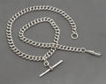 Antique sterling silver double Albert watch chain showing terminal jump ring and curb links