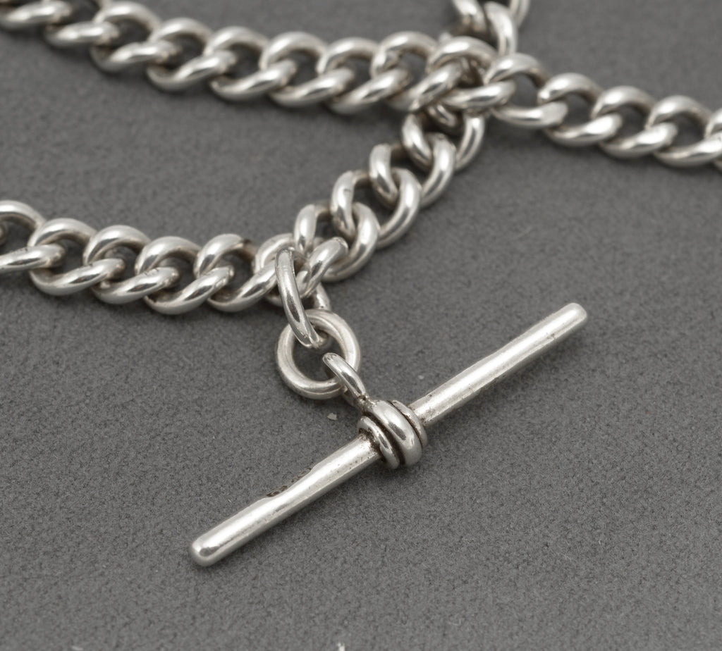 Antique sterling silver double Albert watch chain showing hallmarked T bar