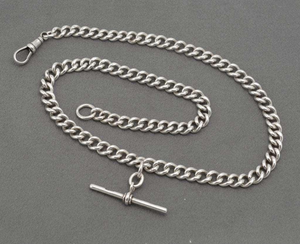 Close view of the sterling silver curb links on an antique double Albert watch chain