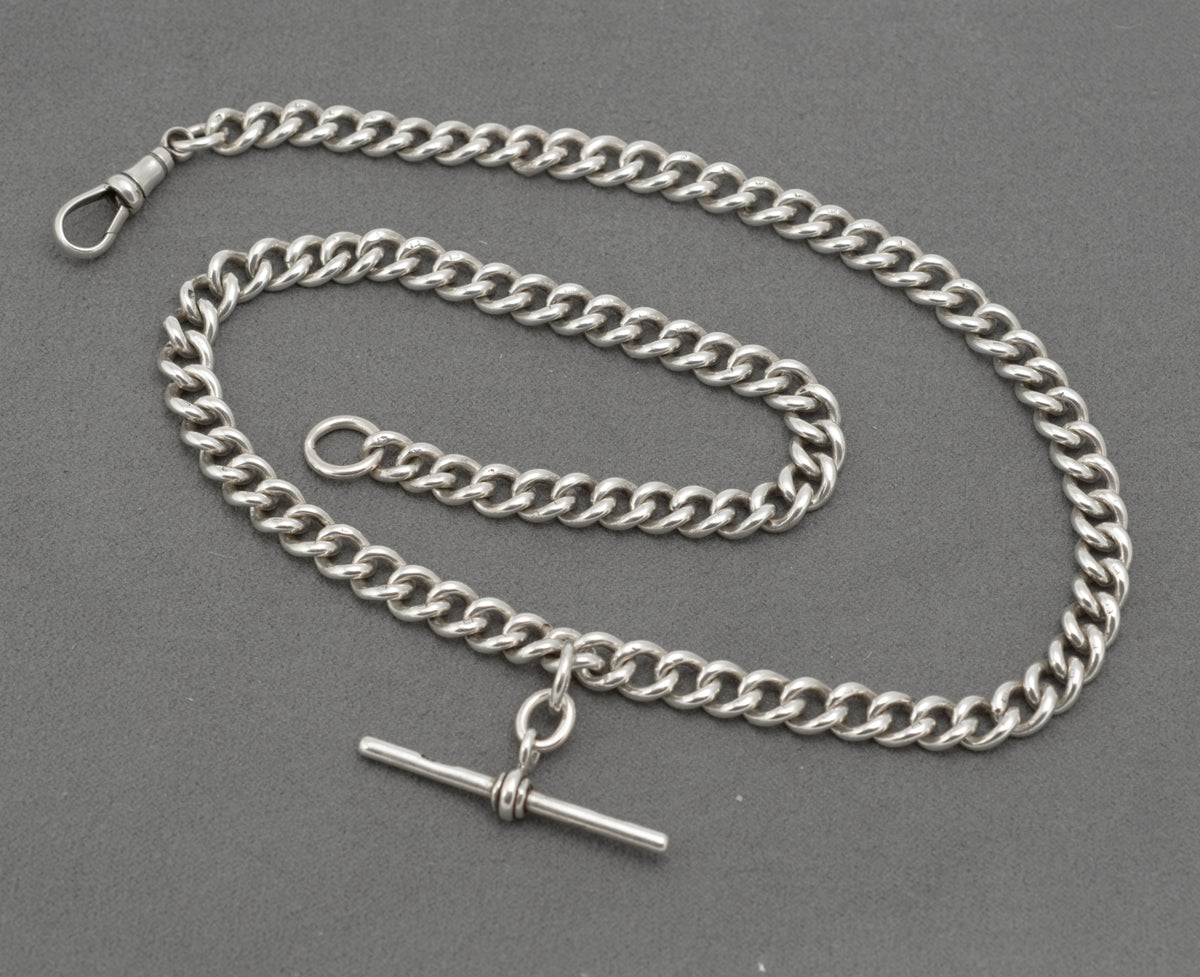 Close view of the sterling silver curb links on an antique double Albert watch chain