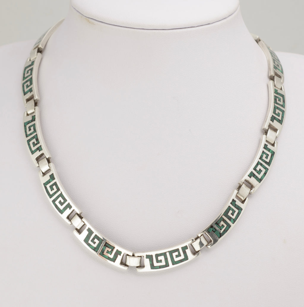 Vintage Mexican sterling silver choker necklace worn on display, showing length and close fitting choker style