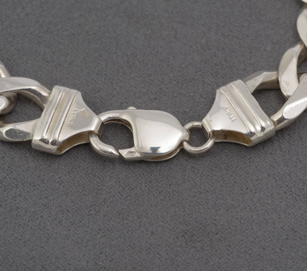 Italian sterling silver bracelet, full view of flat curb links and clasp fittings